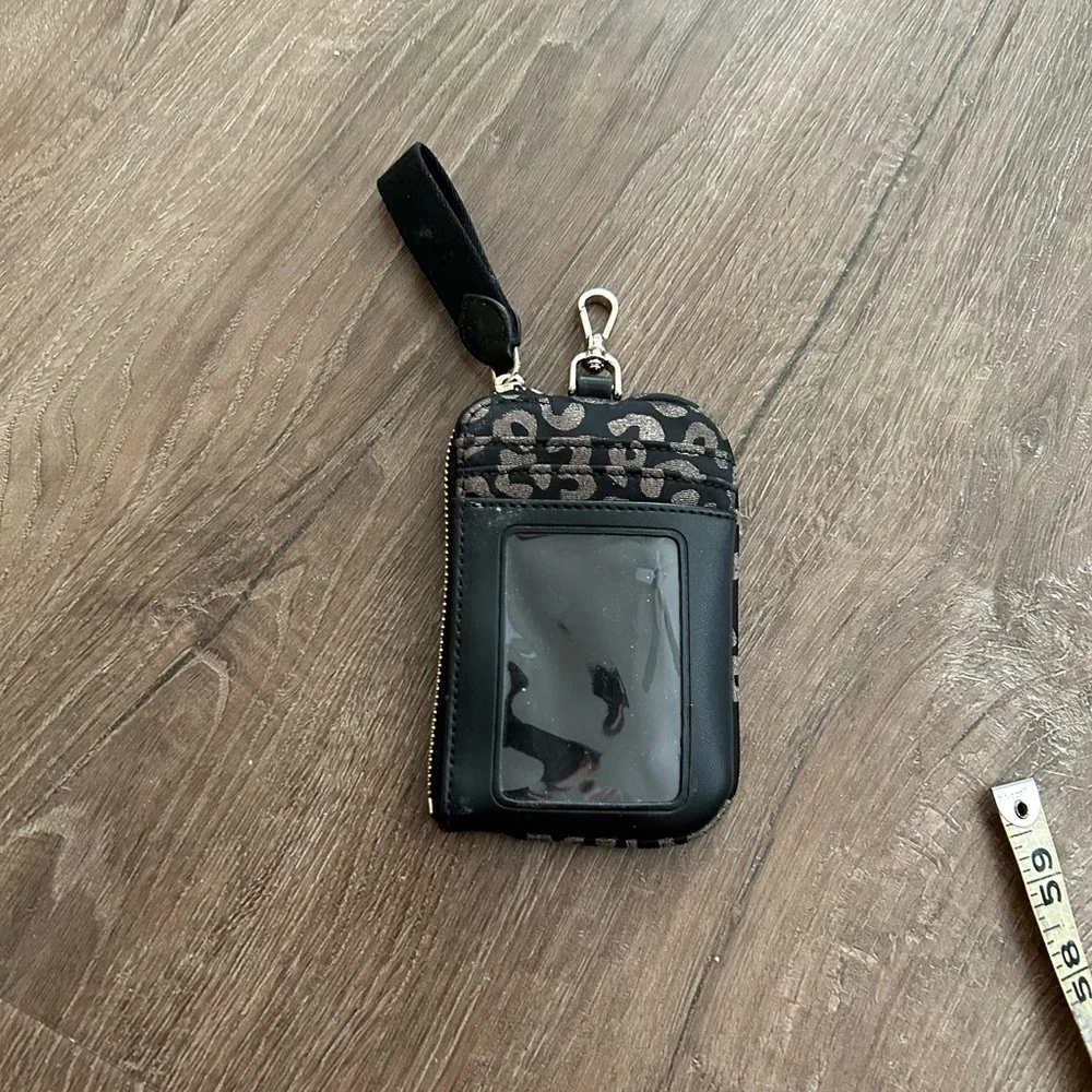 Kate Spade EUC Black and Gray Animal Print Wristlet